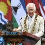Britain's King Charles III speaks at the opening ceremony of the Commonwealth Heads of Government Meeting in Apia, Samoa, on October 25, highlighting themes of unity and historical reconciliation.